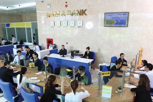 NamA Bank dự kiến điều chỉnh chỉ tiêu tín dụng 2014 lên 60% 