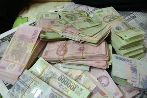 “Tiền thừa” trong kho ngân hàng đang chảy về đâu?