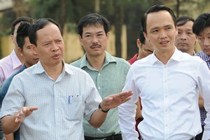 Ông Trịnh Văn Quyết, Chủ tịch HĐQT FLC (bên phải)