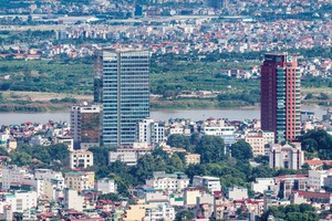 Chủ đầu tư sẽ thêm gánh nặng với tiền đền bù giải phóng mặt bằng - Ảnh: Hoài Nam