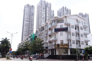 Thị trường BĐS ấm lên mang lại sức sống mới cho bộ mặt đô thị - Ảnh: Lê Toàn