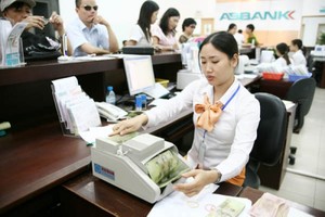 Nợ xấu của hệ thống ngân hàng tính đến ngày 31/12/2014 là 3,8%