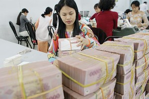 Theo quy luật, lượng tiền lớn đổ về các ngân hàng những ngày sau Tết