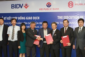 BIDV ký hợp động chuyển nhượng 50% vốn tại VID Public Bank cho PBB từ tháng 7/2014