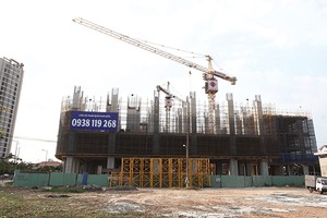 Trong khi thị trường ấm trở lại thì NĐT thứ cấp lẳng lặng thoát hàng vì đã “chịu nhiệt” quá lâu - Ảnh: Lê Toàn