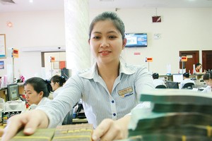 Tất cả các ngân hàng dù mạnh hay yếu đều phải thực hiện tái cơ cấu - Ảnh: Lê Toàn