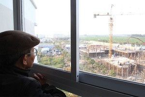 Chủ đầu tư nhà thu nhập thấp bó tay nếu phải đóng thêm vai trò nhà tài trợ cho khách hàng - Ảnh: Hoài Nam