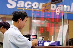 M&A trong linh vực ngân hàng hứa hẹn tiếp tục tăng tốc sau thương vụ SouthernBank sáp nhập Sacombank. Ảnh: Đức Thanh