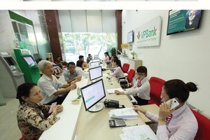 Với 93 triệu dân, Việt Nam có điều kiện thuận lợi phát triển tín dụng tiêu dùng - Ảnh: Đức Thanh