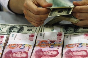 Nếu NDT giảm giá, VND  sẽ ra sao?