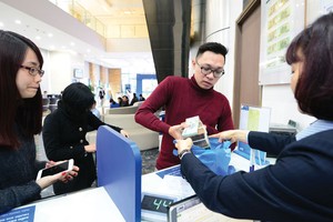 Tăng trưởng tín dụng toàn hệ thống cả năm 2015 ước đạt khoảng 18% 
