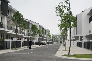 Sau phân khúc căn hộ cao cấp, dòng tiền được dự đoán sẽ dịch chuyển dần sang phân khúc đất nền, biệt thự trong năm 2016. Ảnh: Trọng Tuyến