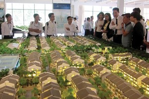 Hàng loạt dự án đất nền, biệt thự vùng ven Hà Nội được giới thiệu ra thị trường trong thời gian vừa qua. Ảnh: Trọng Tuyến
