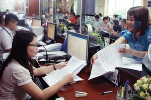 Cần rút ngắn thời gian cấp phép xây dựng và đăng ký tài sản