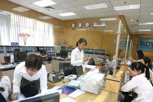 Cần nhất quán trong chính sách cho phép các ngân hàng thương mại nhà nước để lại cổ tức. Ảnh: Đ.T