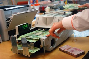 Ngân hàng Nhà nước bãi bỏ hàng loạt giấy phép con 