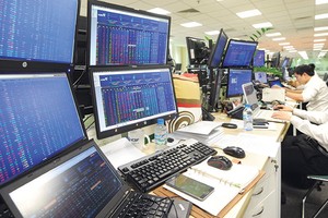 Những bất cập, rườm rà về thủ tục trong quá trình triển khai Thông tư 210/2014 đang “gây vướng” cho các công ty chứng khoán