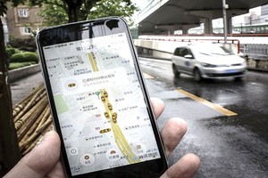 Didi đã mua lại 
Uber Trung Quốc sau thời gian dài cạnh tranh quyết liệt 
