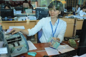 Đẩy mạnh xử lý sở hữu chéo, thoái vốn Nhà nước tại ngân hàng… là một trong nhiều nguyên nhân khiến các nhà băng “lỡ hẹn” tăng vốn trong năm nay 