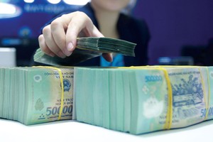 Đến cuối tháng 11, dư nợ cho vay toàn ngành ngân hàng tăng trưởng 15% so với đầu năm 
