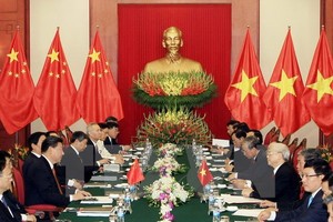 Tổng Bí thư Nguyễn Phú Trọng hội đàm với Tổng Bí thư, Chủ tịch nước Trung Quốc Tập Cận Bình trong chuyến thăm Việt Nam của ông Tập Cận Bình, tháng 11/2015. (Ảnh: Vietnam+)