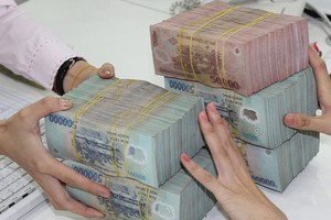 Các nhà băng vẫn phải tăng cường trích dự phòng rủi ro từ lợi nhuận để xử lý nợ xấu