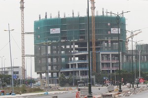 Những thương vụ M&A nhằm thâu tóm quỹ đất đang diễn ra rất sôi động. Ảnh: Gia Huy