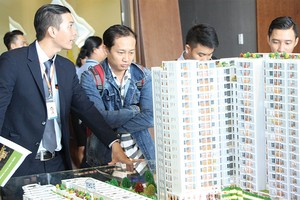 Môi giới bất động sản như cánh tay nối dài giữa chủ đầu tư với khách hàng. Ảnh: Gia Huy