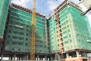 Hàng triệu người lao động nghèo TP.HCM vẫn mong đợi điều 
đột phá trong việc cho phép xây nhà diện tích dưới 45 m2Ảnh: Gia Huy