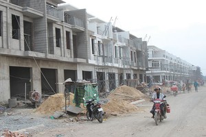 Thị trường bất động sản TP.HCM đang có nhiều yếu tố hỗ trợ để bứt phá trong những tháng cuối năm. Ảnh: Gia Huy