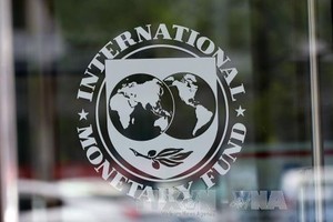 IMF quan ngại đà phục hồi kinh tế toàn cầu. Ảnh minh họa: TTXVN
