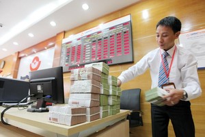 Tín dụng đã cải thiện ngay từ những tháng đầu năm 2017, đóng góp tích cực vào kết quả kinh doanh của các ngân hàng. Ảnh: Đức Thanh