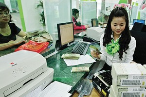 Dự trữ ngoại hối tăng cao góp phần giúp Ngân hàng Nhà nước ổn định tỷ giá và hỗ trợ tăng trưởng kinh tế