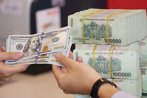 Lần đầu tiên kể từ tháng 3/2014, Ngân hàng Nhà nước điều chỉnh giảm 0,25% lãi suất điều hành