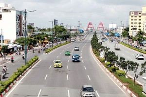 Đường Phạm Văn Đồng được đánh giá là tuyến đường đẹp nhất nhì TP.HCM. Ảnh: Gia Huy