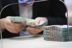 Hậu M&A ngân hàng, xử lý nợ xấu vẫn là thách thức