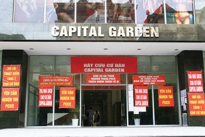 Nếu không ngồi lại với nhau và tìm được tiếng nói chung, mâu thuẫn chung cư sẽ không thể kết thúc. Ảnh: Thanh Huyền