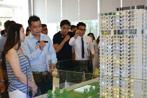 Việc đưa tỷ lệ vốn ngắn hạn cho vay trung, dài hạn từ 45% về 40% từ 1/1/2019 được dự báo sẽ ảnh hưởng tiêu cực tới thị trường bất động sản. Ảnh: Quang Huy