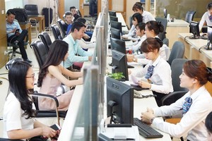 Năm 2018, tín dụng tăng chậm, nhưng các ngân hàng vẫn duy trì được lợi nhuận tốt nhờ đẩy mạnh bán lẻ. Ảnh: Đ.T