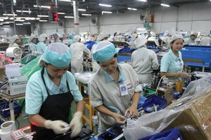 Quý I, sản xuất công nghiệp chế biến - chế tạo tăng 12,35%. Trong ảnh: Nhà máy Canon Việt Nam. Ảnh: Đ.T