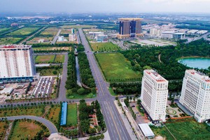 Thị trường bất động sản Bình Dương bắt đầu được nhà đầu tư quan tâm trở lại. Ảnh: Lê Toàn