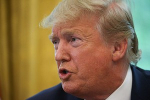 Tổng thống Mỹ Donald Trump phát biểu tại Phòng bầu dục ở Nhà Trắng ngày 26-7-2019 - Ảnh: REUTERS