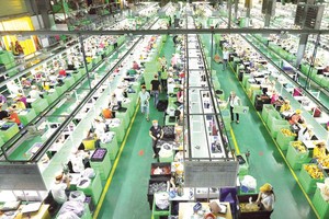 Để đạt mục tiêu trở thành quốc gia thu nhập trung bình khá vào năm 2030, Việt Nam cần có các giải pháp tăng năng suất lao động. Ảnh: Đức Thanh