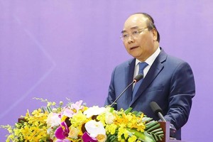 Thủ tướng Chính phủ Nguyễn Xuân Phúc phát biểu tại phiên toàn thể của Diễn đàn Cải cách và Phát triển Việt Nam 2019 (VRDF.2019) - Ảnh Đức Thanh