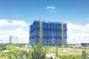 Để hoàn thành thủ thục xây dựng đối với 1 dự án nhà ở phải mất thời gian 2-3 năm, thậm chí lâu hơn. Ảnh: Trọng Tín