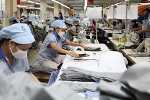 Dệt may là một trong những lĩnh vực chịu tác động mạnh từ xung đột thương mại Mỹ - Trung. Ảnh: Đức Thanh