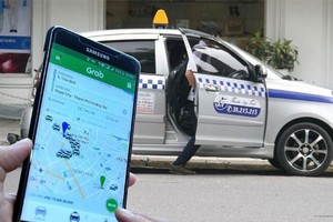 Dừng thí điểm ứng dụng gọi xe công nghệ: Cuộc chơi mới trên thị trường