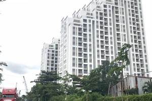 Quy định phải có 100% đất ở thì mới được chỉ định chủ đầu tư dự án nhà ở thương mại là một trong những vướng mắc rất lớn và cũng là một nguyên nhân chủ yếu gây ách tắc thị trường bất động sản hiện nay.