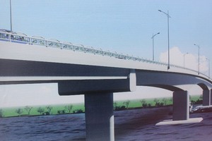 Cầu Châu Đốc sẽ thay thế phà Châu Giang, kết nối TP. Châu Đốc và thị xã Tân Châu. Trong ảnh: Mô hình cầu Châu Đốc.
