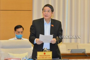 Chủ nhiệm Ủy ban Tài chính - Ngân sách Nguyễn Đức Hải trình bày báo cáo thẩm tra đề xuất của Chính phủ về sửa đổi, bổ sung một số cơ chế, chính sách tài chính - ngân sách đặc thù đối với Thủ đô Hà Nội.